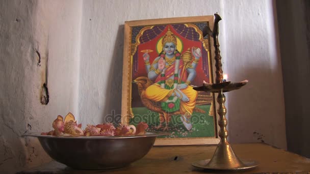 Praying place with picture of Shani — Stock Video