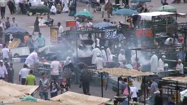 People on streets of Djemaa el Fna — Stock Video