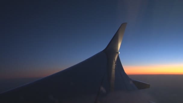 Plane wing in sky with clouds — Stock Video