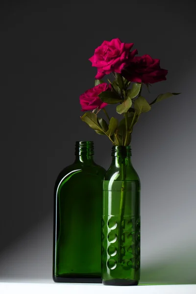 Red Rose Green Bottle — Stock Photo, Image