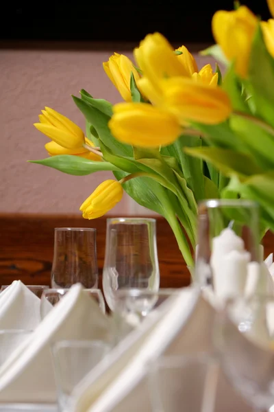 Decoration of yellow tulips for a holiday.