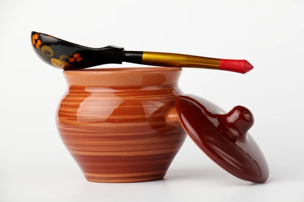 Seramik saksı ve kaşık.