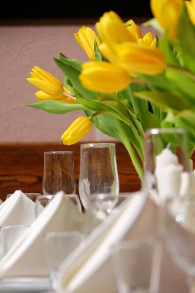 Decoration of yellow tulips for a holiday.