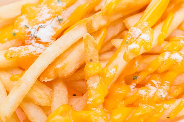 Close up french fries with cheese — Stock Photo, Image