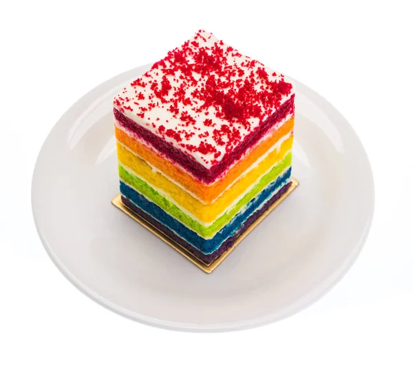 Rainbow cake on white plate isolated on white background — Stock Photo, Image