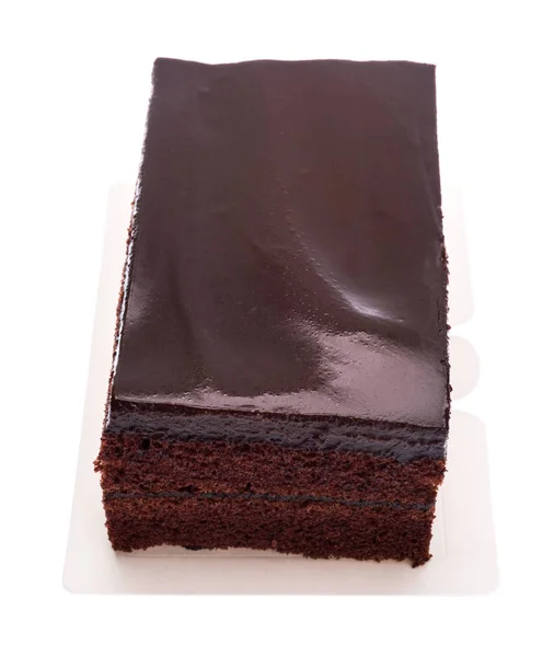 Schokoladenkuchenscheibe auf weißem Hintergrund — Stockfoto