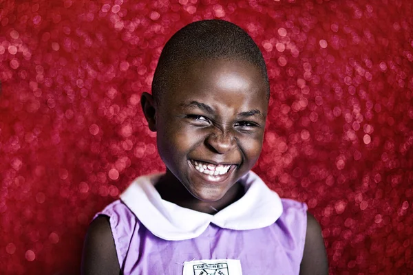 Happy laughing ugandan girl in Jinja