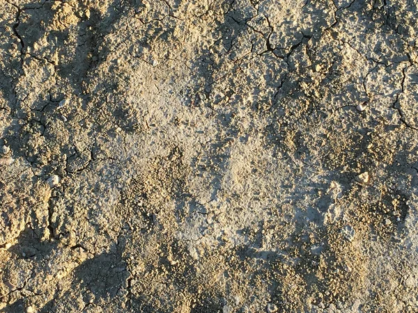 Трещины в текстуре почвы — стоковое фото