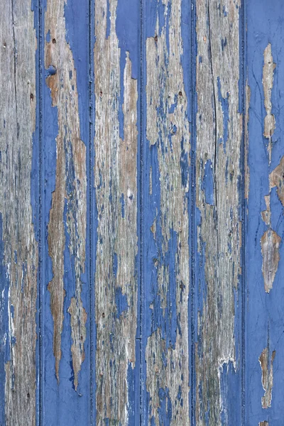 Peeling blue paint on wooden door or fence — Stock Photo, Image