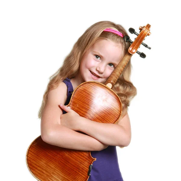 Petite fille en robe violette avec violon — Photo