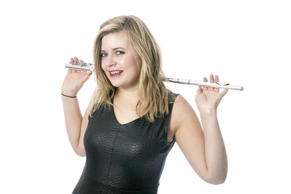 Young blond woman and flute against white background — Stock Photo, Image