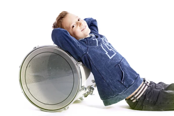 Teenage boy and drum on floor of studio — Stock Photo, Image