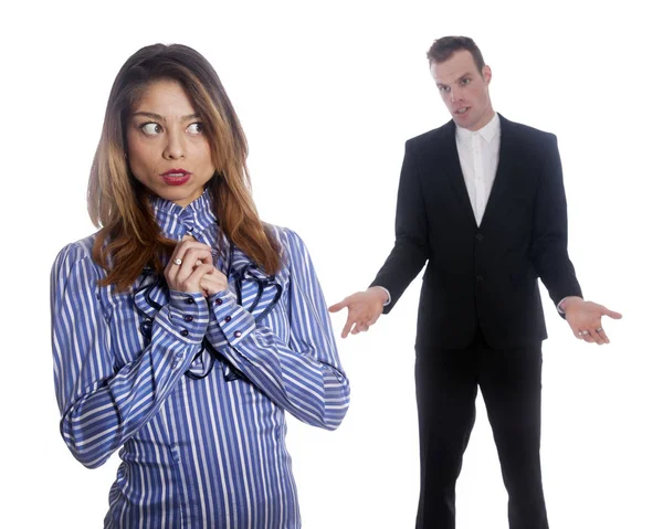 Female subordinate worries anxiously while male boss stands in b — Stock Photo, Image