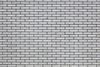 Gri boyalı tuğla duvarın yatay kısmı