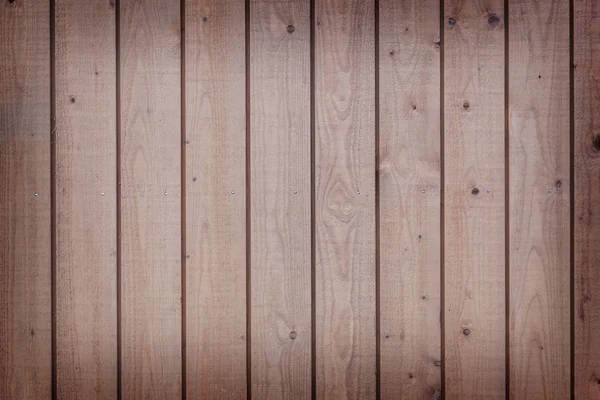 Horizontale deel van verticale planken met licht bruine verf — Stockfoto