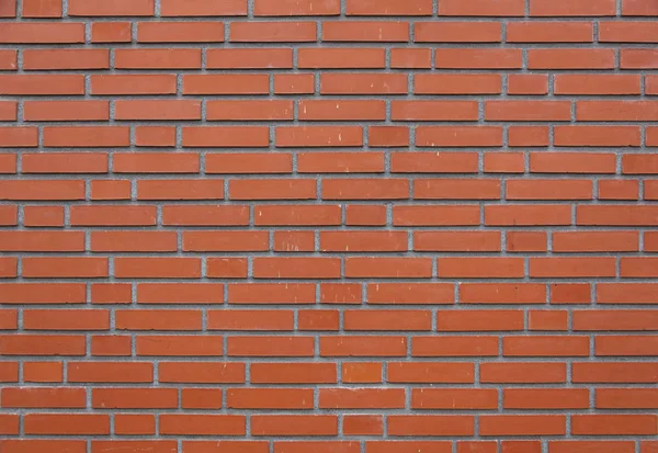 Horizontale deel van oranje muur — Stockfoto