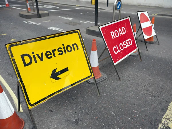 Road signs with the words diversity and road closed on london st — Stock Photo, Image