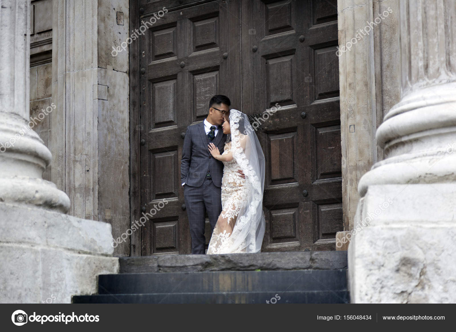 A Beautiful Asian Bride In A Black Wedding Dress Poses Stock Photo -  Download Image Now - iStock