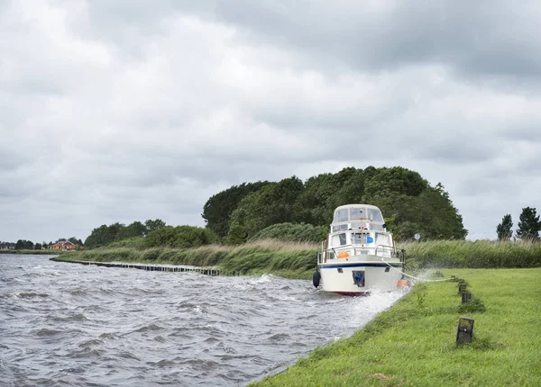 Yaught on lake near Sneek in dutch province of friesland during — Stock Photo, Image