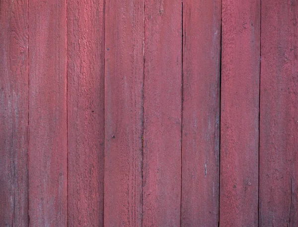 Part of shed built of vertical red painted planks — Stock Photo, Image