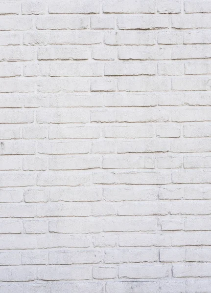 Vertical part of old white painted brick wall — Stock Photo, Image