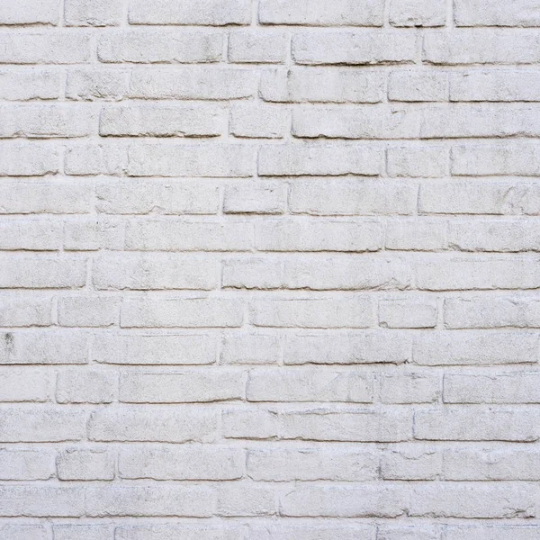 Partie carrée de mur de briques peintes en blanc — Photo