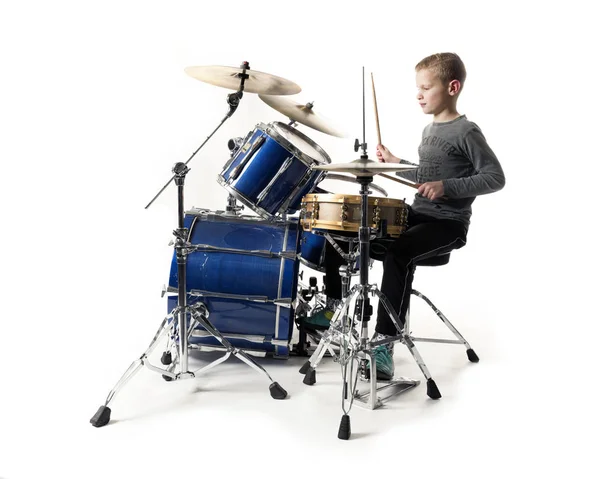 Yount blond teen boy at drum kit — Stock Photo, Image