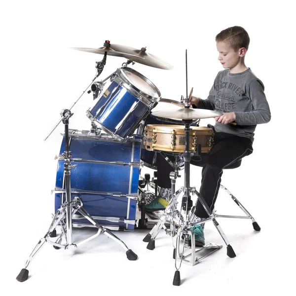 Yount blond teen boy at drum kit — Stock Photo, Image