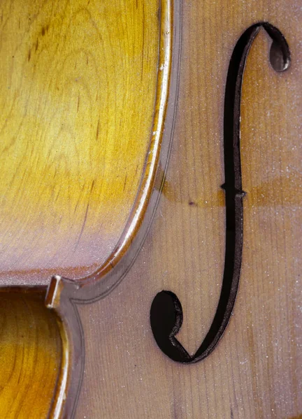 Close-up de instrumento de corda de parte violoncelo com f buracos — Fotografia de Stock
