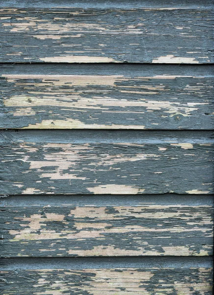 Part of old wooden green painted peeling old wood of shed or fence — Stock Photo, Image
