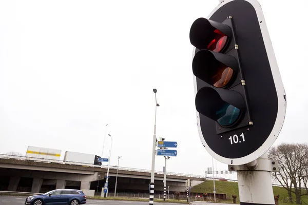 Red traffic lights and overcast sky — Stock Photo, Image