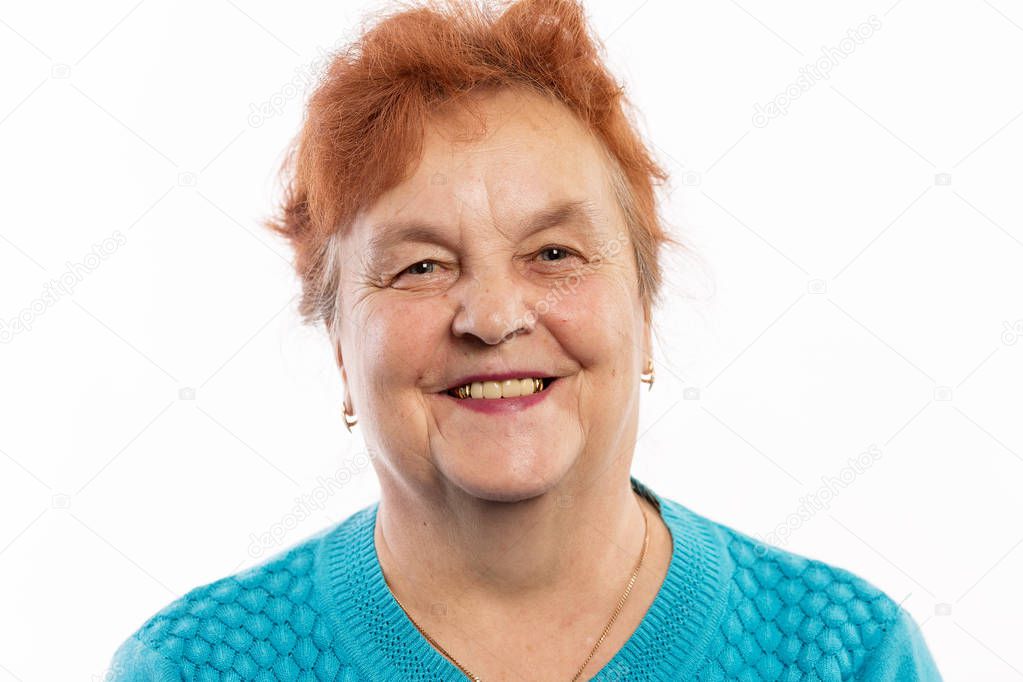 The old woman smiles