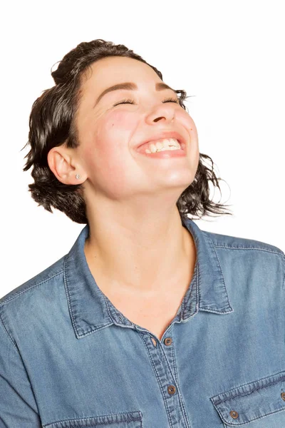 Beautiful young girl with a fashionable haircut laughing — Stock Photo, Image
