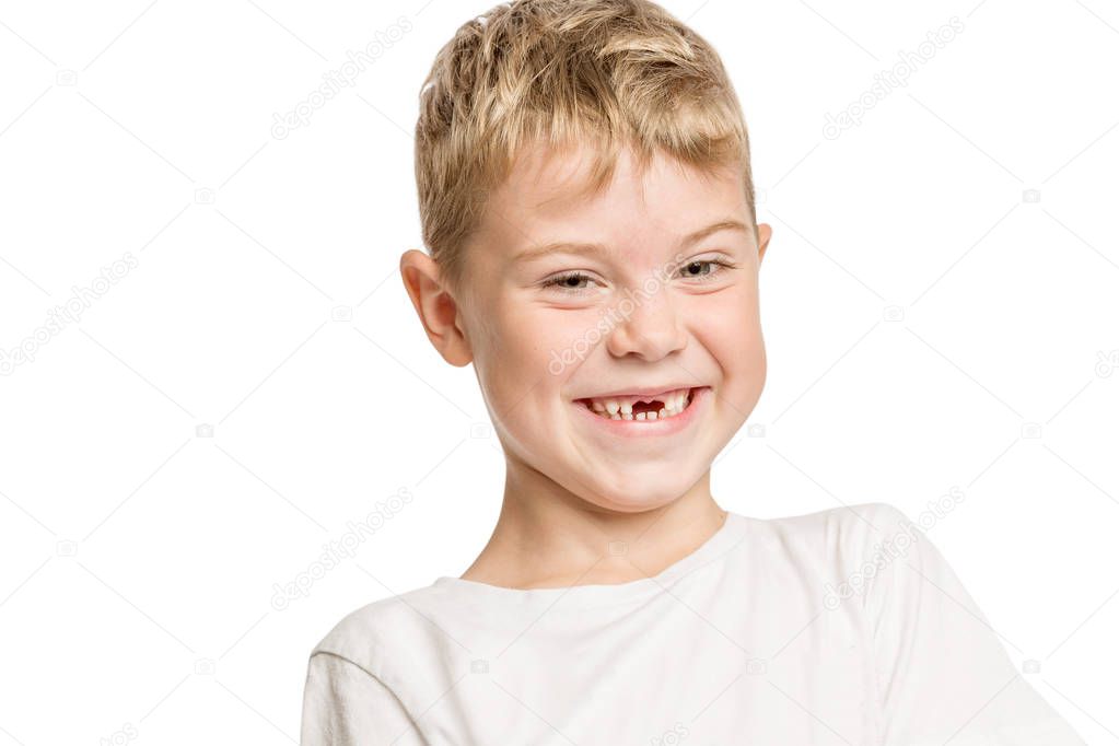 Cute little boy without anterior teeth laughing, isolated on white background