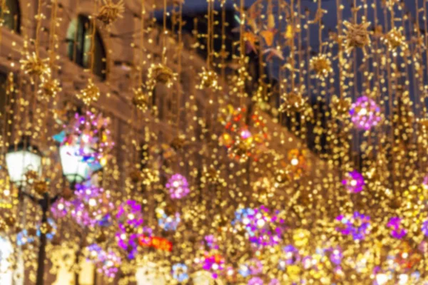 New Year's street illumination. Blurred. Background. Space for text. — Stock Photo, Image