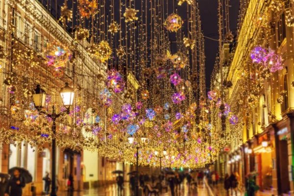 New Year\'s street illumination. Blurred. Background. Space for text.