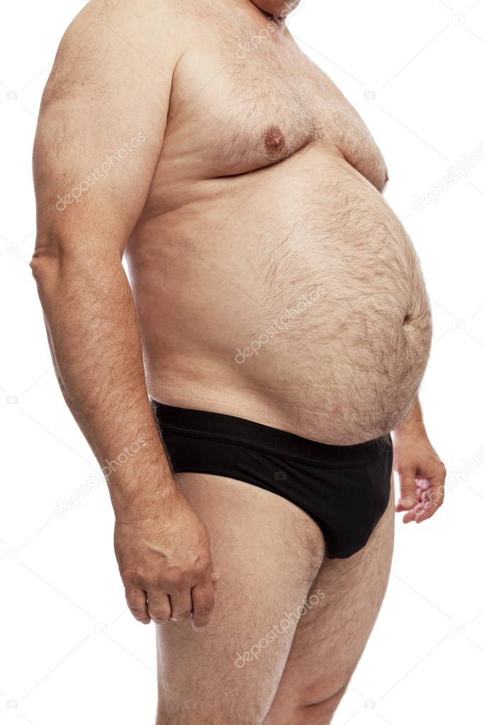Fat man with a big belly. Side view. Isolated over white background.