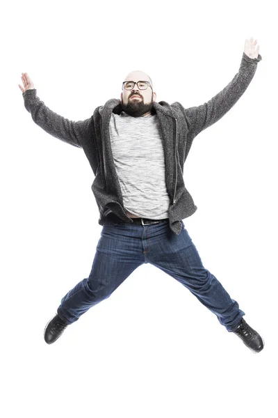 Ein Glatzköpfiger Mann Mit Brille Springt Emotional Auf Weißer Hintergrund — Stockfoto