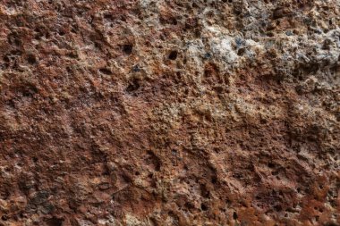 Doğal koyu gri taşın yüzeyi. Yakın plan. Geçmişi. Metin için boşluk. 