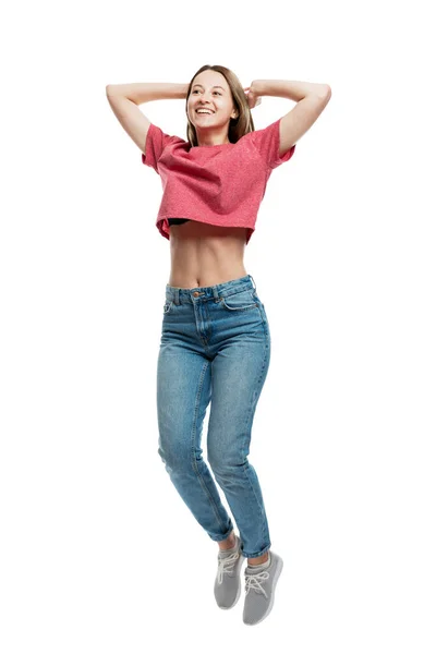 Sonriente Jovencita Feliz Jeans Saltando Emocionalmente Mientras Toma Mano Detrás — Foto de Stock