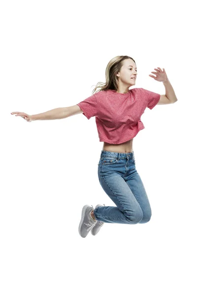 Smiling Young Girl Jeans Red Shirt Jumping Positive Happy Eared — Stock Photo, Image