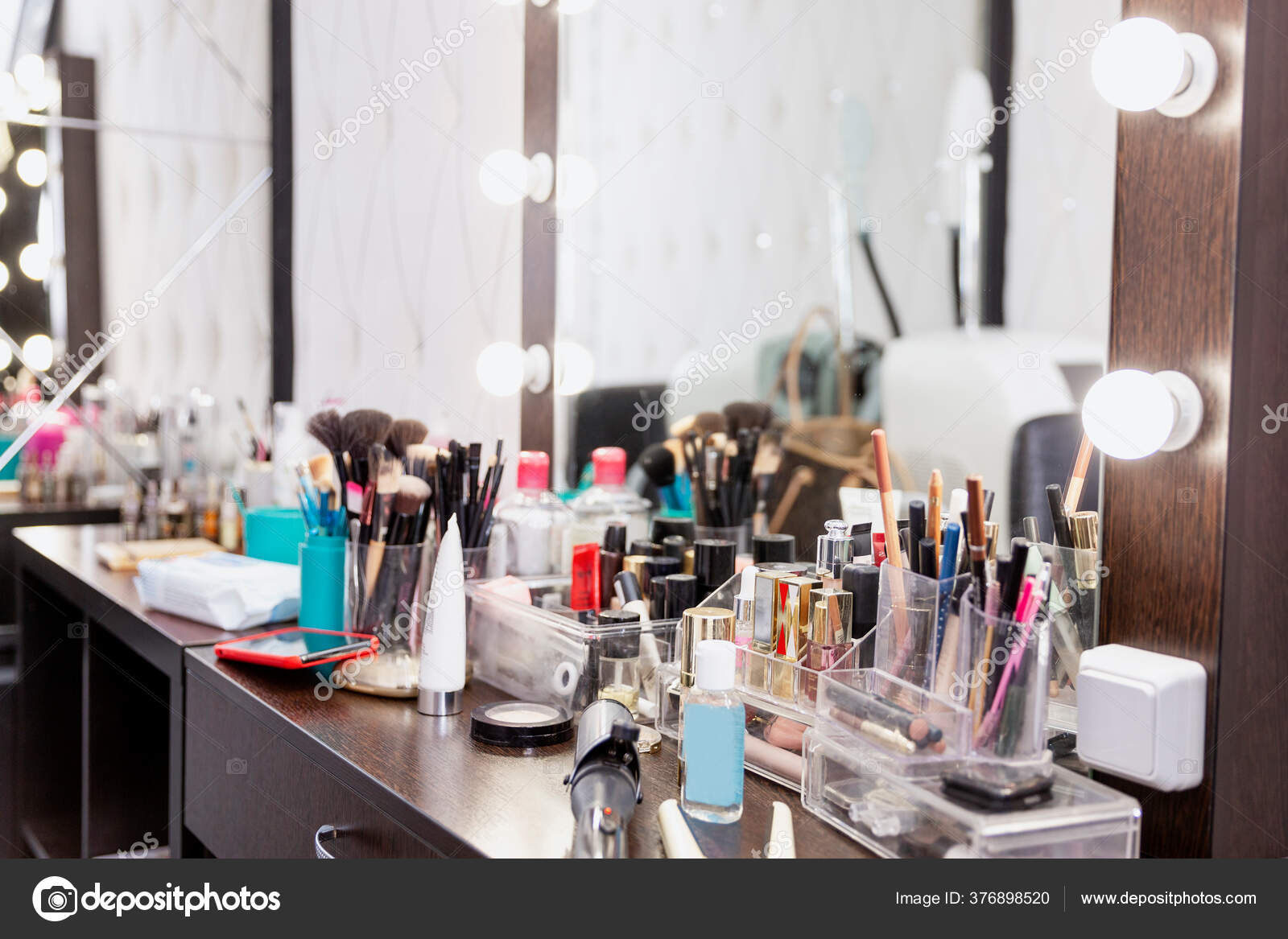 Dressing table in a beauty salon with lots of cosmetics. 6 Dressing table in a beauty salon with lots of cosmetics. 6