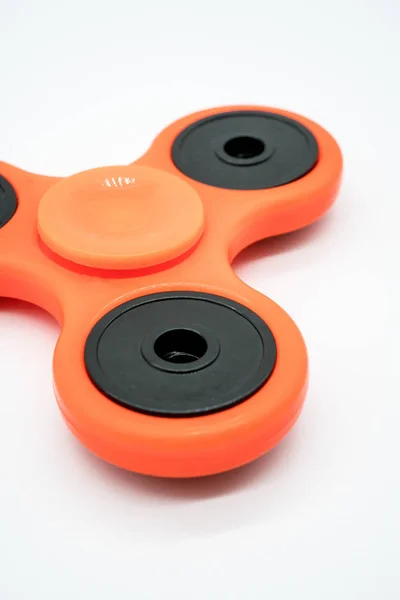 Oranje fidget spinner — Stockfoto