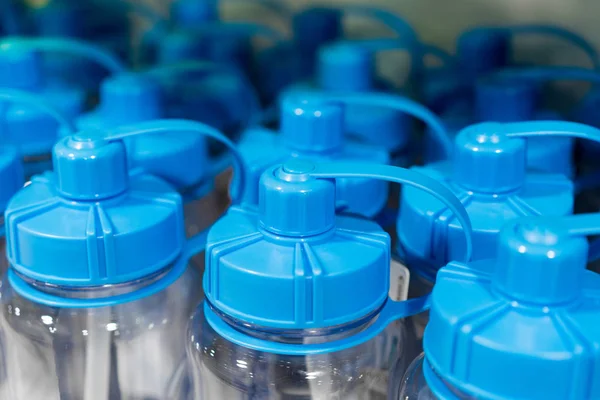 Blue sport drink bottles with safety cap — Stock Photo, Image