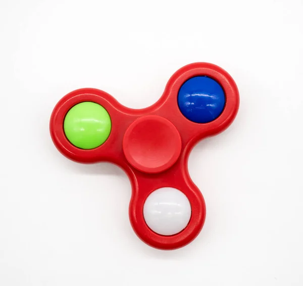 Red fidget spinner with LED inside — Stock Photo, Image
