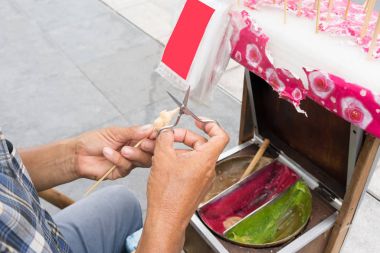 Asya adam kalıplama geleneksel sanat şeker şeker fo ile gelen eller