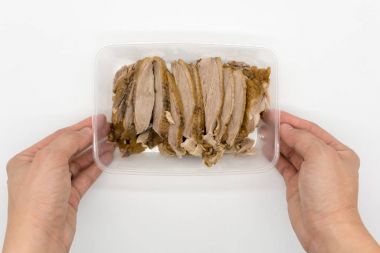 Steamed ördek tutan el / hizmet olarak saydam plastik kaz 