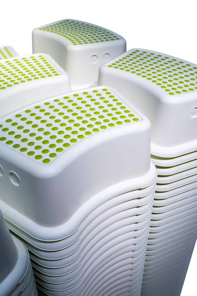 Stacks of mini square shape short stool with green polka dot pat — Stock Photo, Image