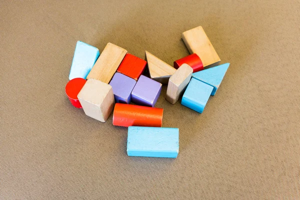A heap of multicolor wooden blocks in different shapes — Stock Photo, Image