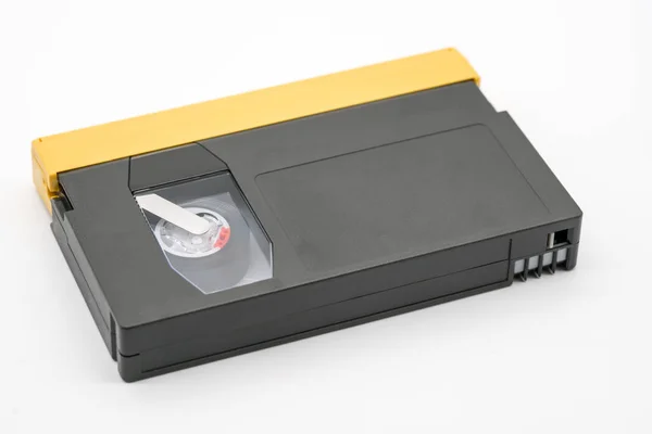 透明なプラスチックの p と黒とゴールドの色でデジタル ビデオ テープ — ストック写真